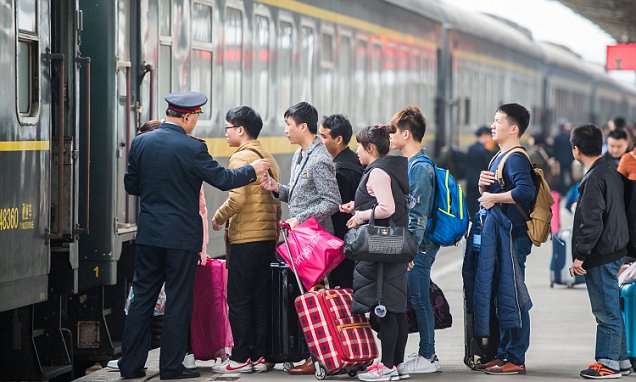 Mandatory Credit: Photo by Imaginechina/REX/Shutterstock (9374201k) Passengers wait in line to board a train on their way back home for the upcoming Chinese Lunar New Year, also known as Spring Festival, at the Shenzhen West Railway Station in Shenzhen city, south China's Guangdong province Spring Festival travel rush, China - 11 Feb 2018 Chinese transportation authorities on Sunday (11 February 2018) reported a slight drop in the number of trips made during the first 10 days of the annual 40-day Spring Festival travel rush. Chinese people made 732 million trips via railway, road, waterway, and plane from Feb. 1 to Feb. 10, down 3.3 percent year on year, according to the Ministry of Transport (MOT). Spring Festival, or Chinese Lunar New Year, is the most important occasion for family gatherings and falls on Feb. 16 this year. The peak travel period around the festival, also known as "Chunyun," will last for 40 days From Feb. 1 to Mar. 12, as many Chinese people return to their hometowns.